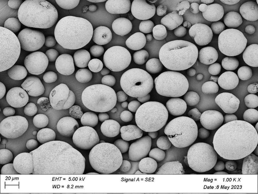 Figure3-high-res-image-powder-H-and-M-Analytical Figure 3 - High resolution image of a powder, showing spherical particles in the 20-100μm range
